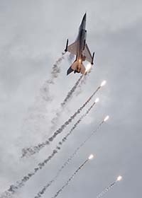 A belgian F16 doing its party trick with flares, Eastbourne, Aug 2017