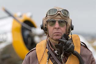 Re-enactor in front of a Curtis P36 Hawk, Duxford, July 2015