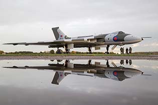 Reflections in a convenient puddle, Vulcan XM655, Wellesbourne, Oct 2015