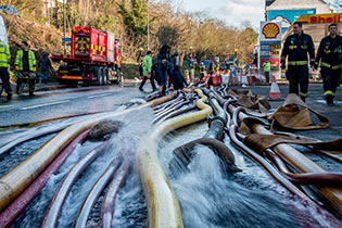 Flood relief pipes on Godstone Road, Purley, during the February 2014 floods